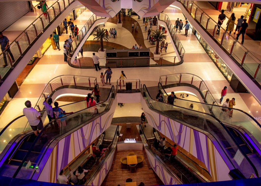 inside of a mall with escalators
