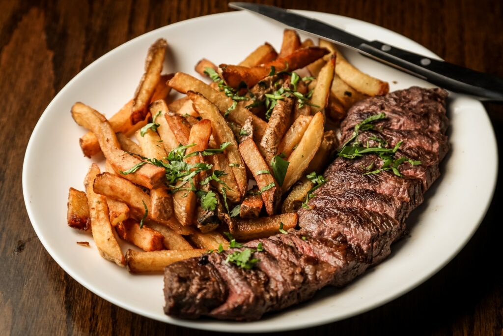 Steak and fries on a plate