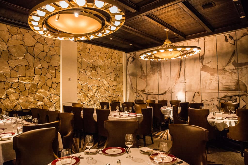 Image of the seating area of Delmonico Steakhouse by Emeril Lagasse