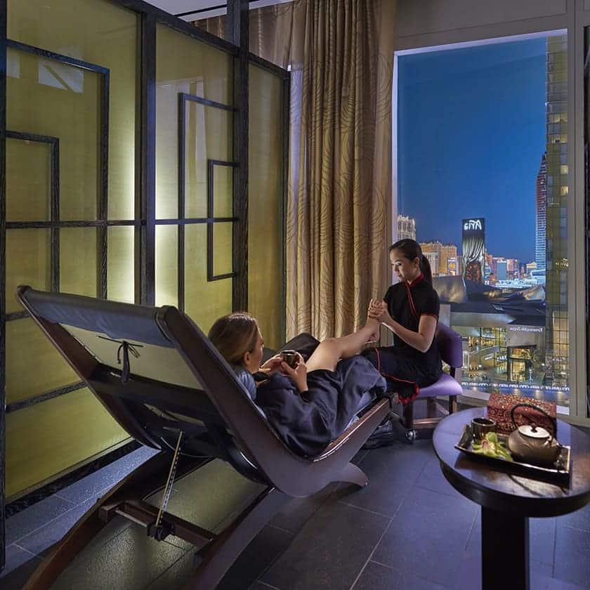 Image of a guest receiving a  foot massage at the Waldorf Astoria in Las Vegas