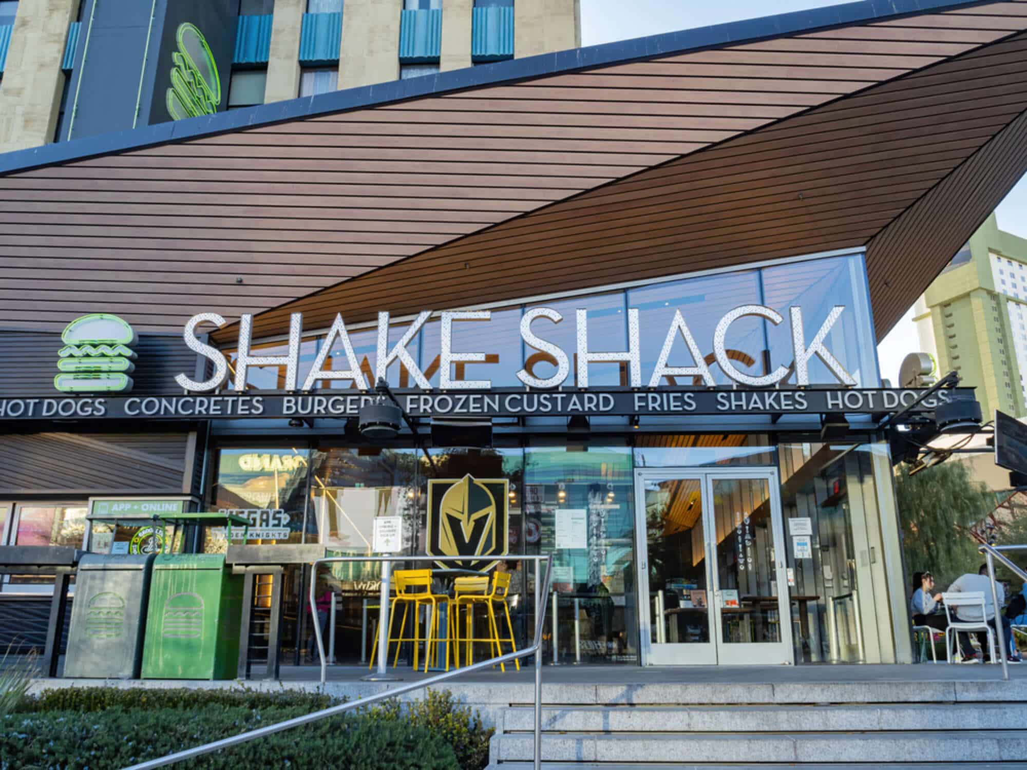 Image of the outside of Shake Shack, one of many cheap restaurant on the Strip, with a Golden Knights sign