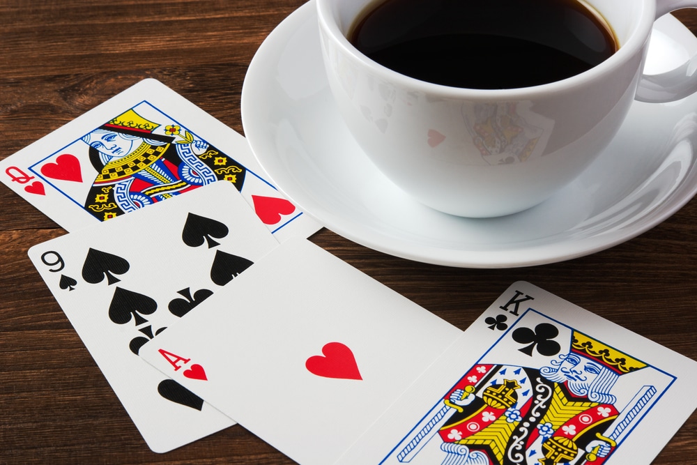 Playing cards with cup of coffee in coffee shops on the Strip