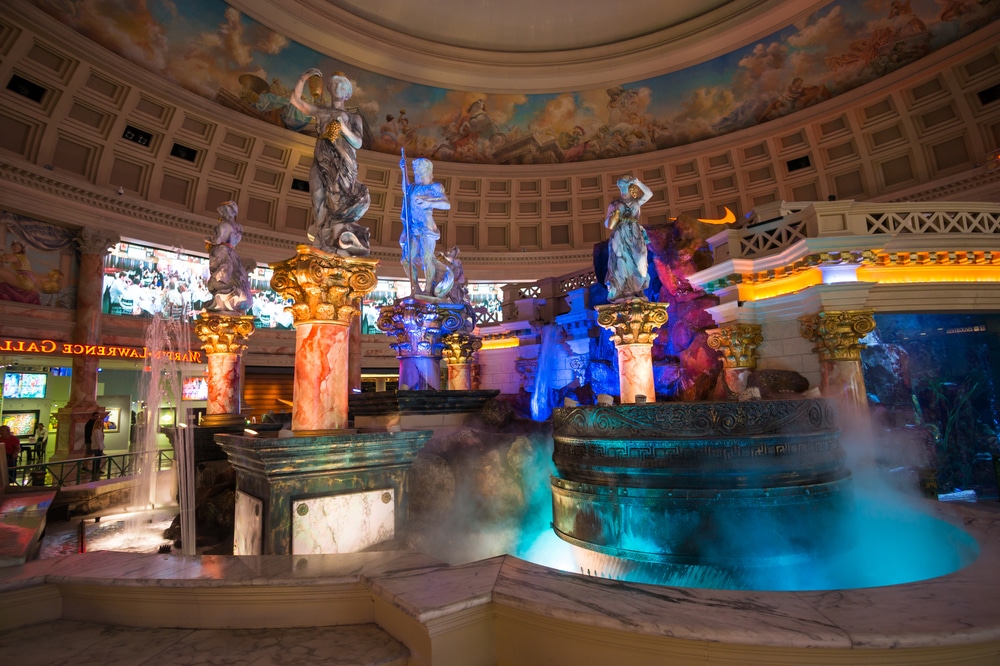 Caesars Palace with colorful statues display 