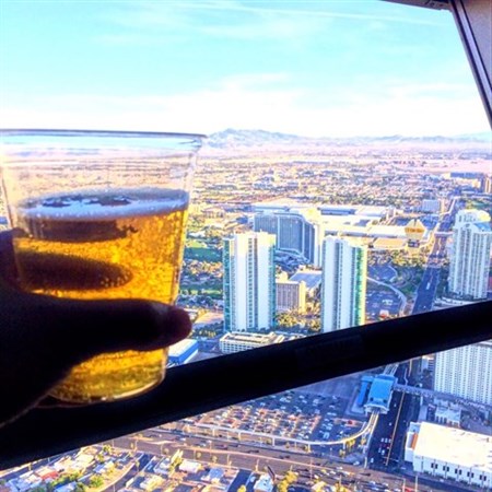 beer being enjoyed on top of the world at air bar the strat