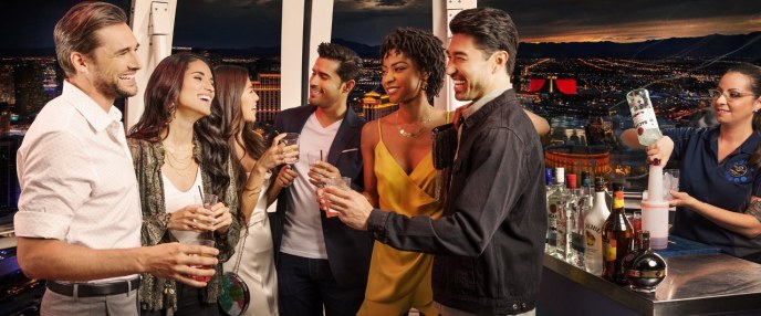 image of las vegas party goers enjoying happy hour on the high roller 