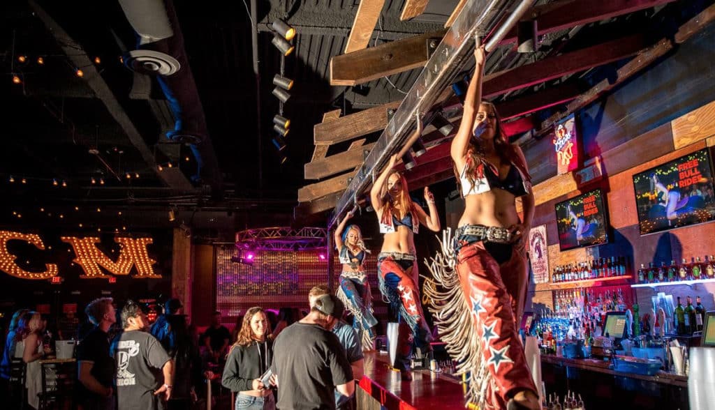 girls dancing on bar in Stoney's Rockin country  