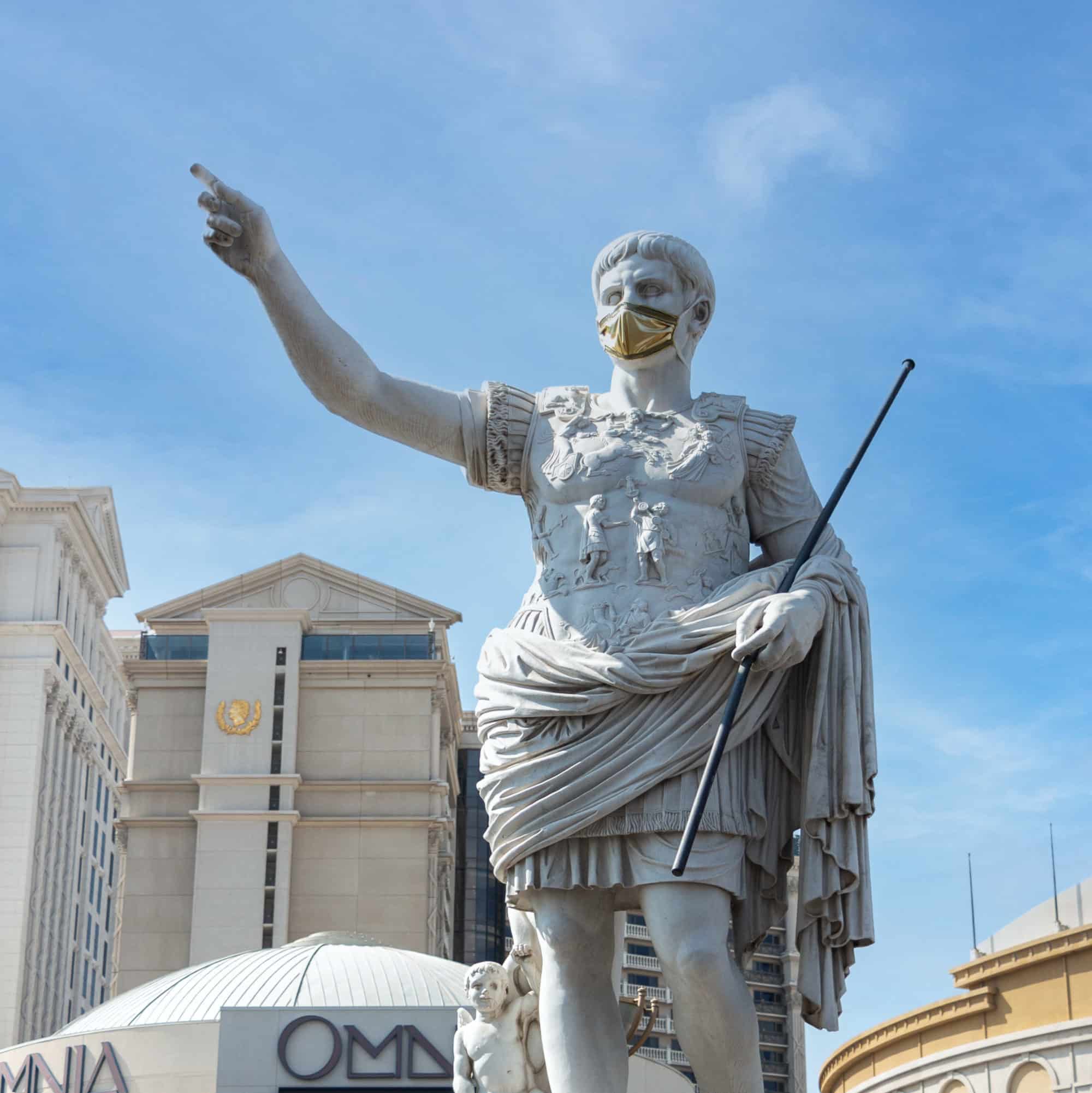 Caesars Palace statue with mask