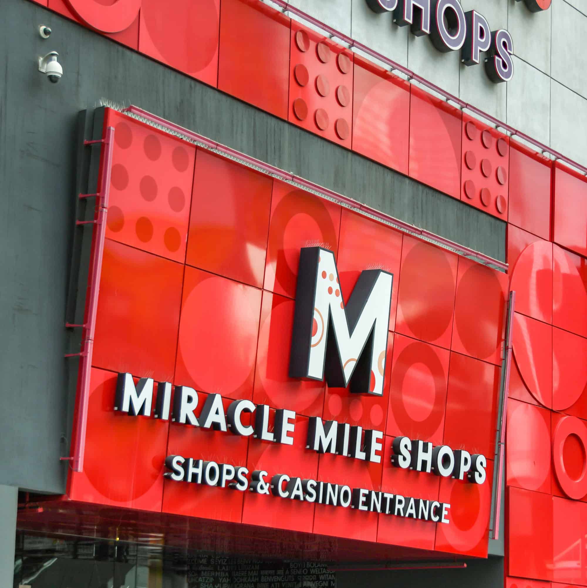 red sign of Miracle Mile Shops