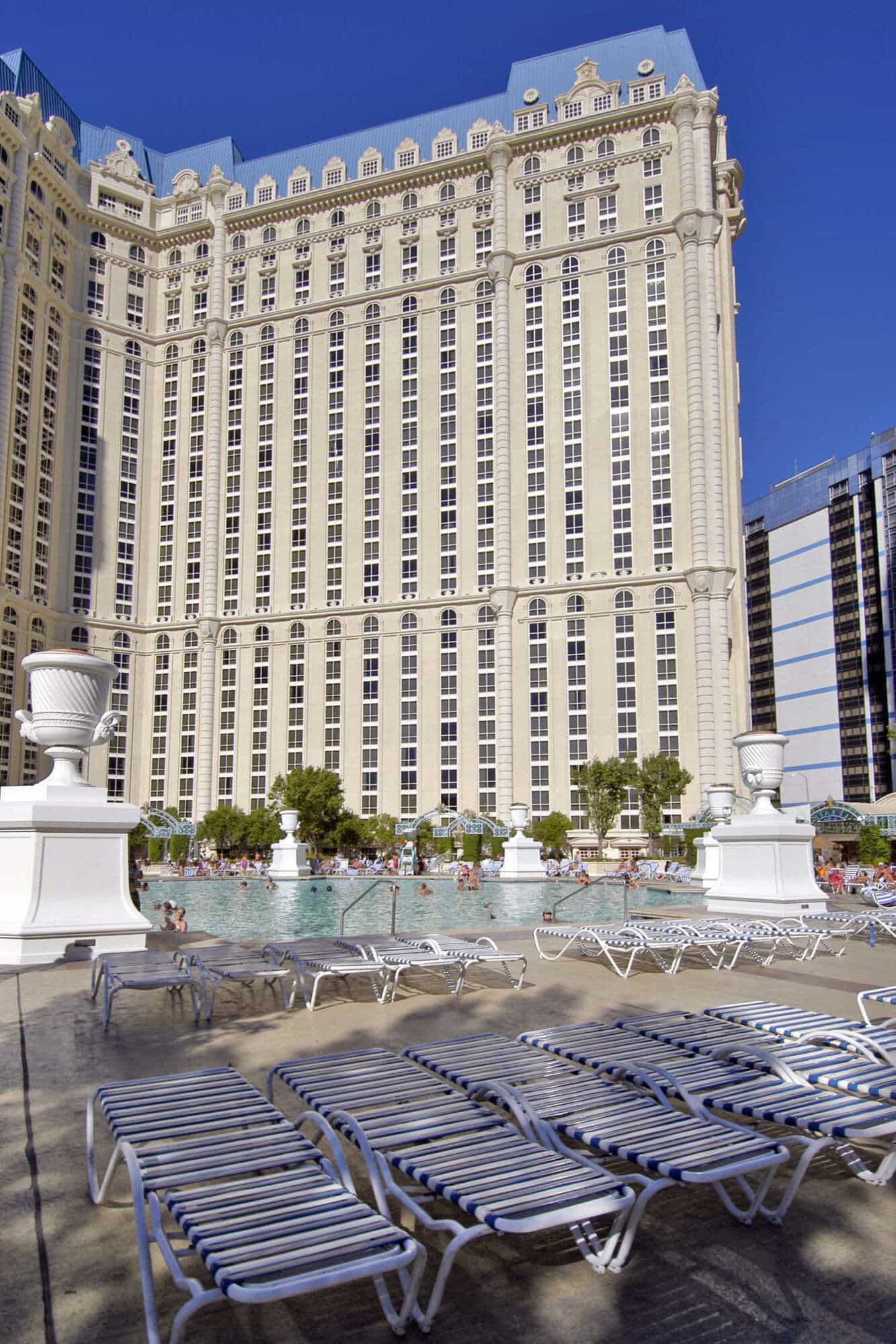 Relaxing lounge chairs by the Soleil Pool with a serene ambiance at Paris Las Vegas Hotel.