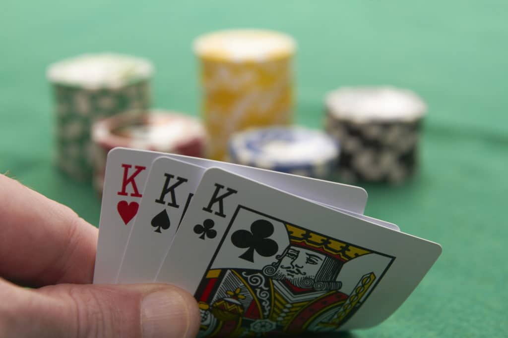 three cards kings gambling poker
