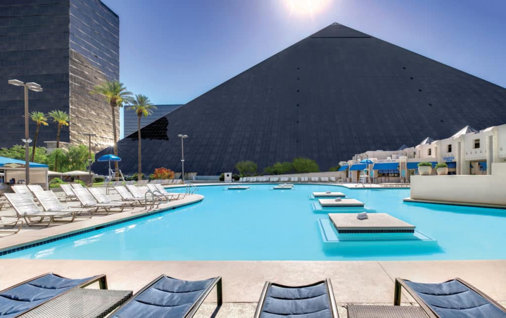 Luxor pool with chaises and the pyramid
