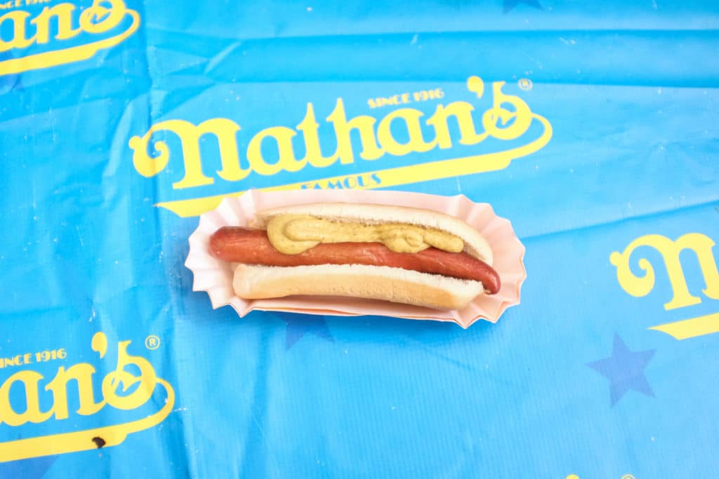 Nathan's Famous hot dog on a logo tablecloth