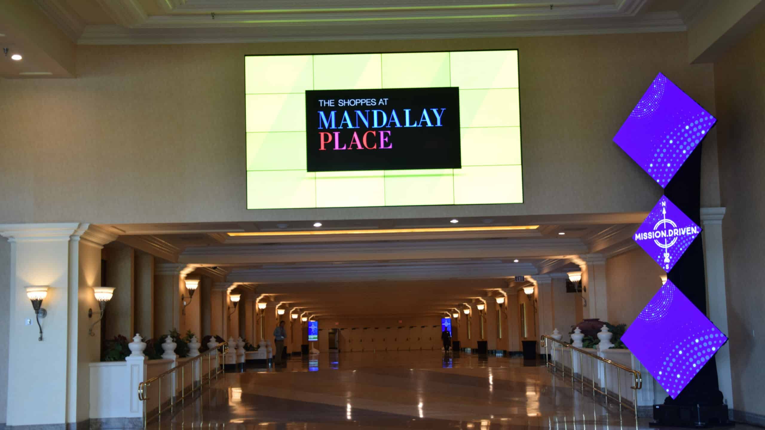 the entrance to The Shoppes at Mandalay Place