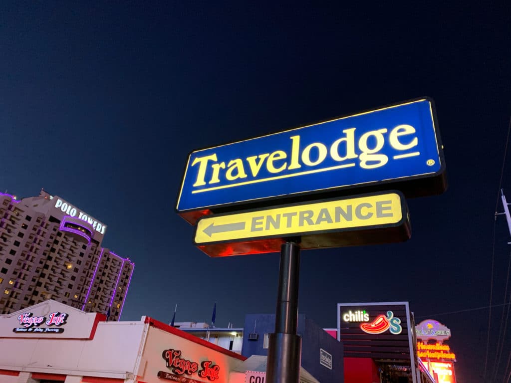 entrance to Travelodge on the Strip by Polo Towers