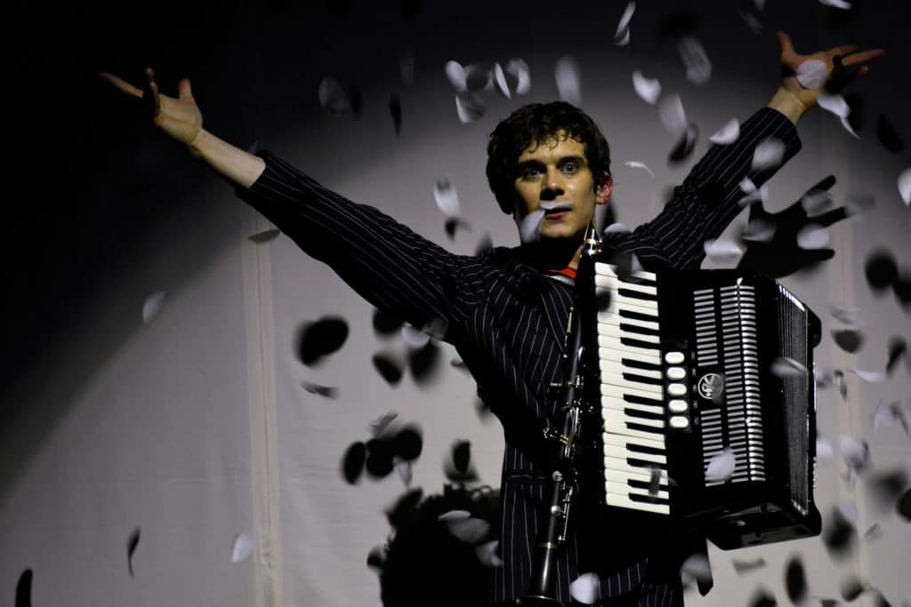 Xavier Mortimer with an accordion