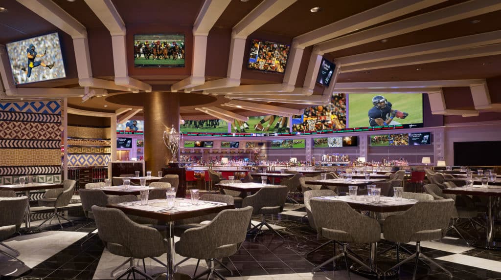 Vibrant interior of Charlie’s Sports Bar, a premier dining spot inside Wynn Las Vegas.