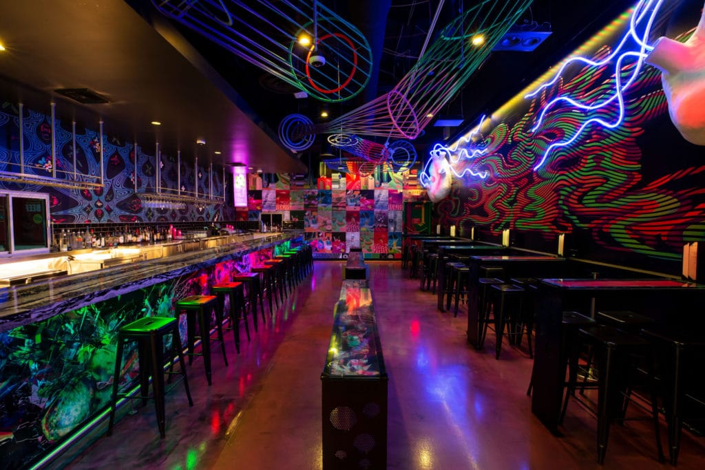 neon lights behind the bar at Datamosh