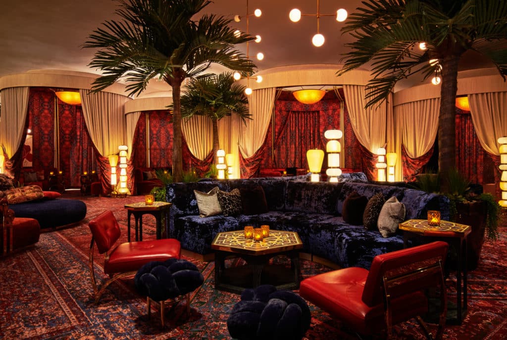 indoor palm trees and velvet curtains at The Shag Room 