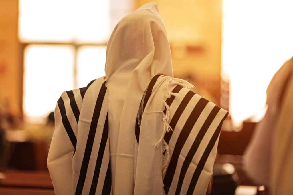 traditional Jewish prayer shawl tillot with black stripes