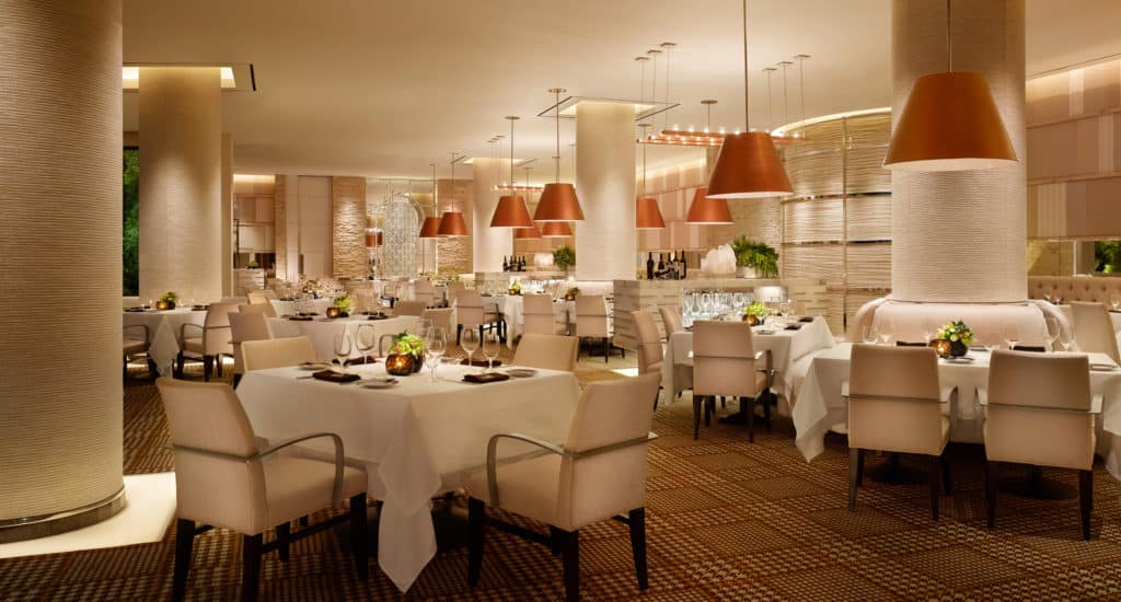 Luxurious and spacious main dining area of SW Steakhouse, showcasing its upscale ambiance within Wynn Las Vegas.