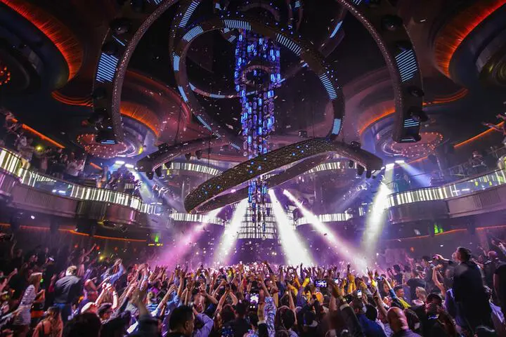 A large crowd are dancing inside a nightclub in Las Vegas