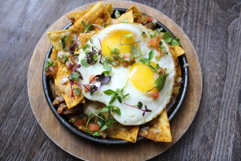 a skillet with chilaquiles