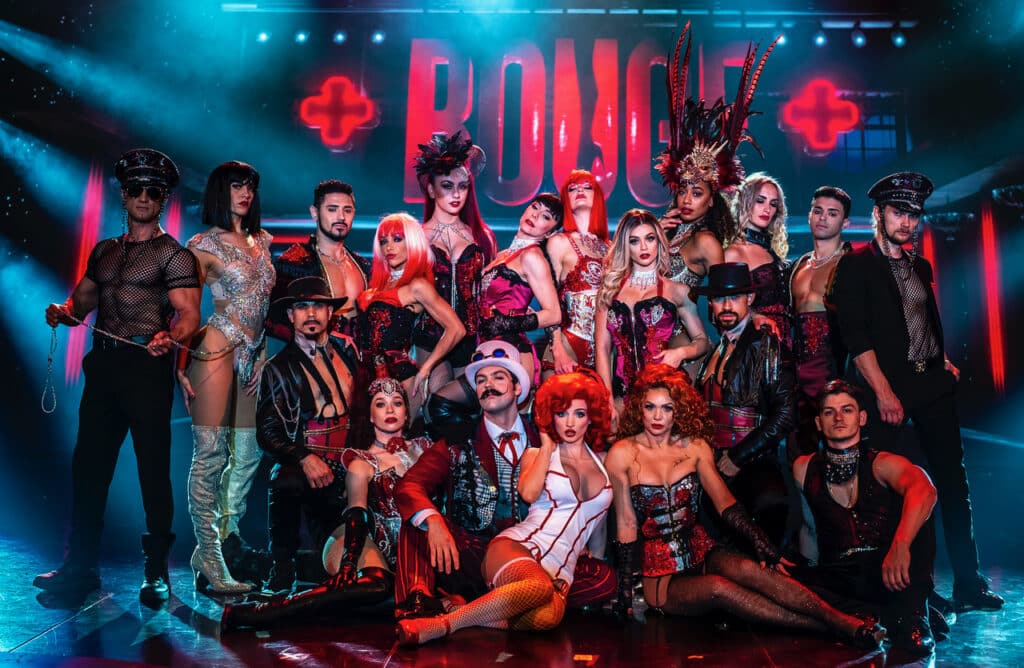 cast photo of ROUGE at The STRAT in costumes
