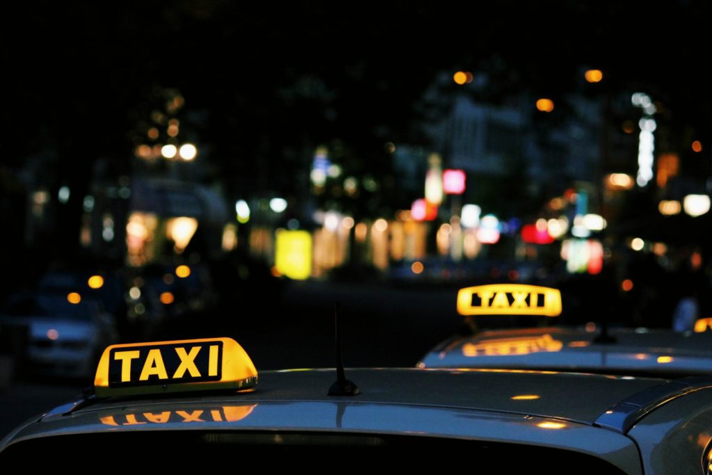 The roofs of taxis at night