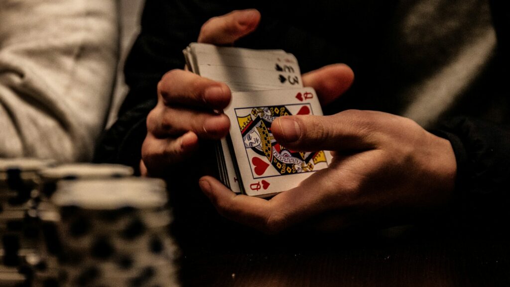 A man shuffles cards