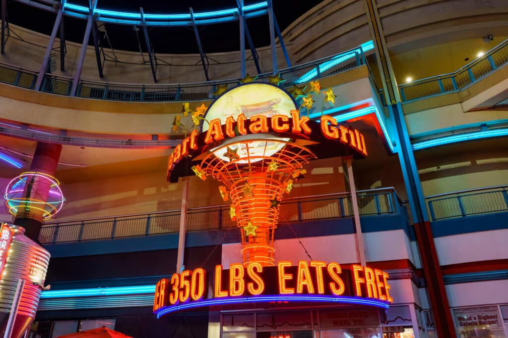 neon sign in front of Heart Attack Grill